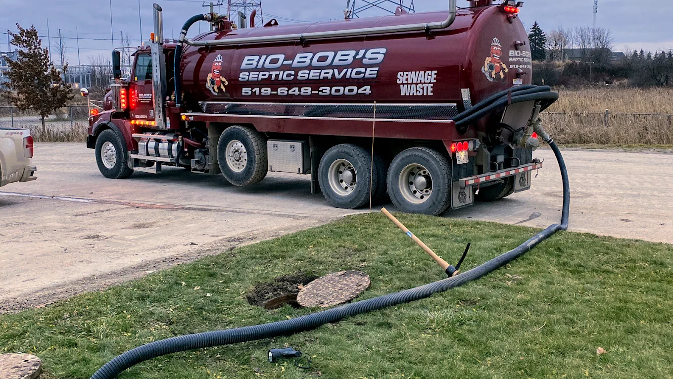Bio-Bob's tanker pumping a septic tank through an open access lid