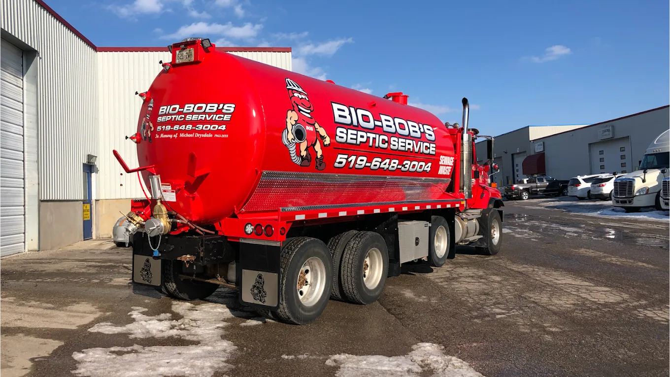 Rear of a Bio-Bob's vacuum tank with the mascot and phone number
